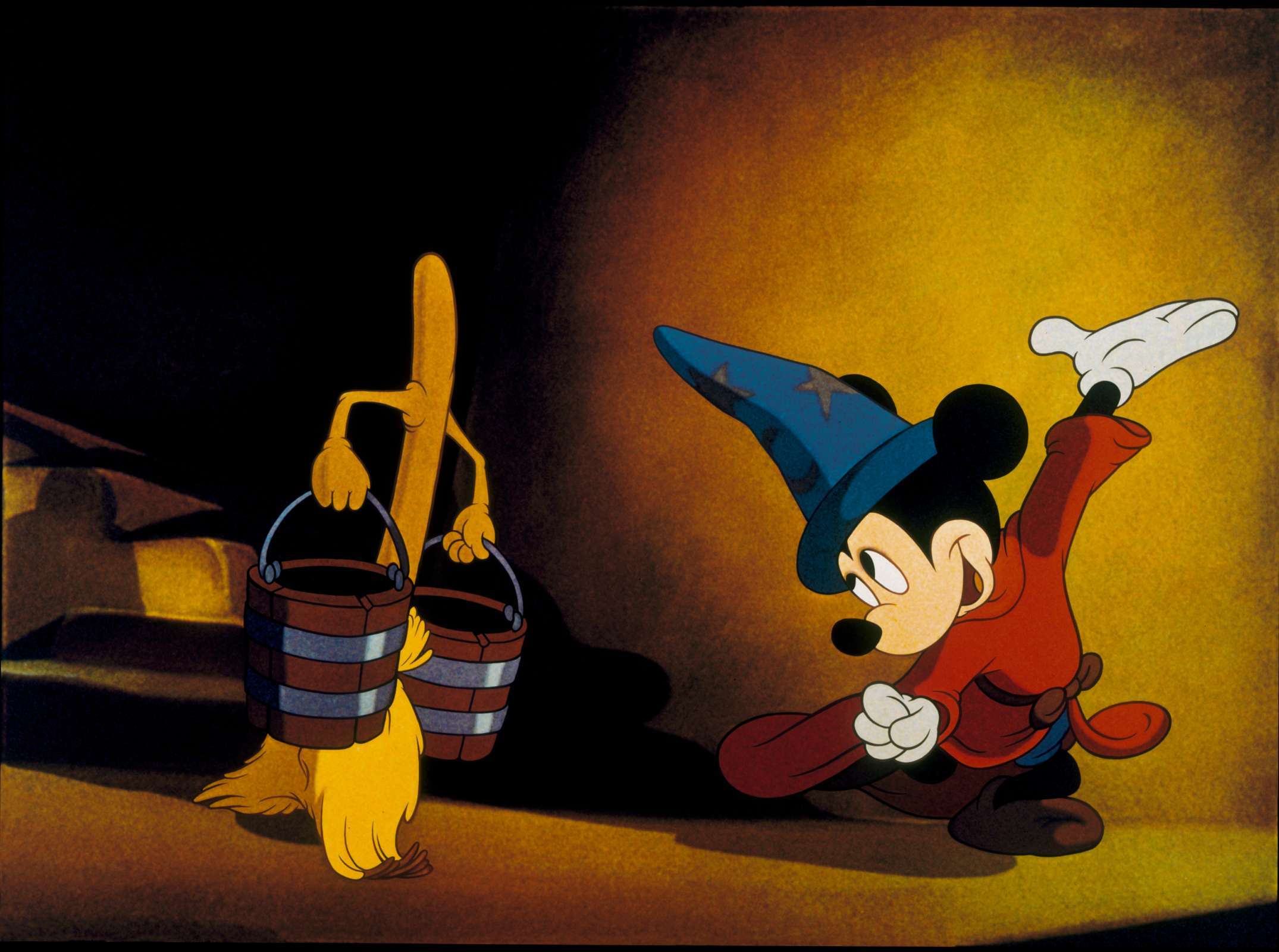 Mickey Mouse in the iconic <i>The Sorcerer's Apprentice</i> segment of Disney's film <i>Fantasia</i> &copy; Disney | Source: Purchase DVD/Blu-ray FANTASIA