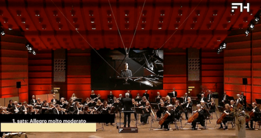 Víkingur Ólafsson is beamed into the Grieghallen © Bergen International Festival