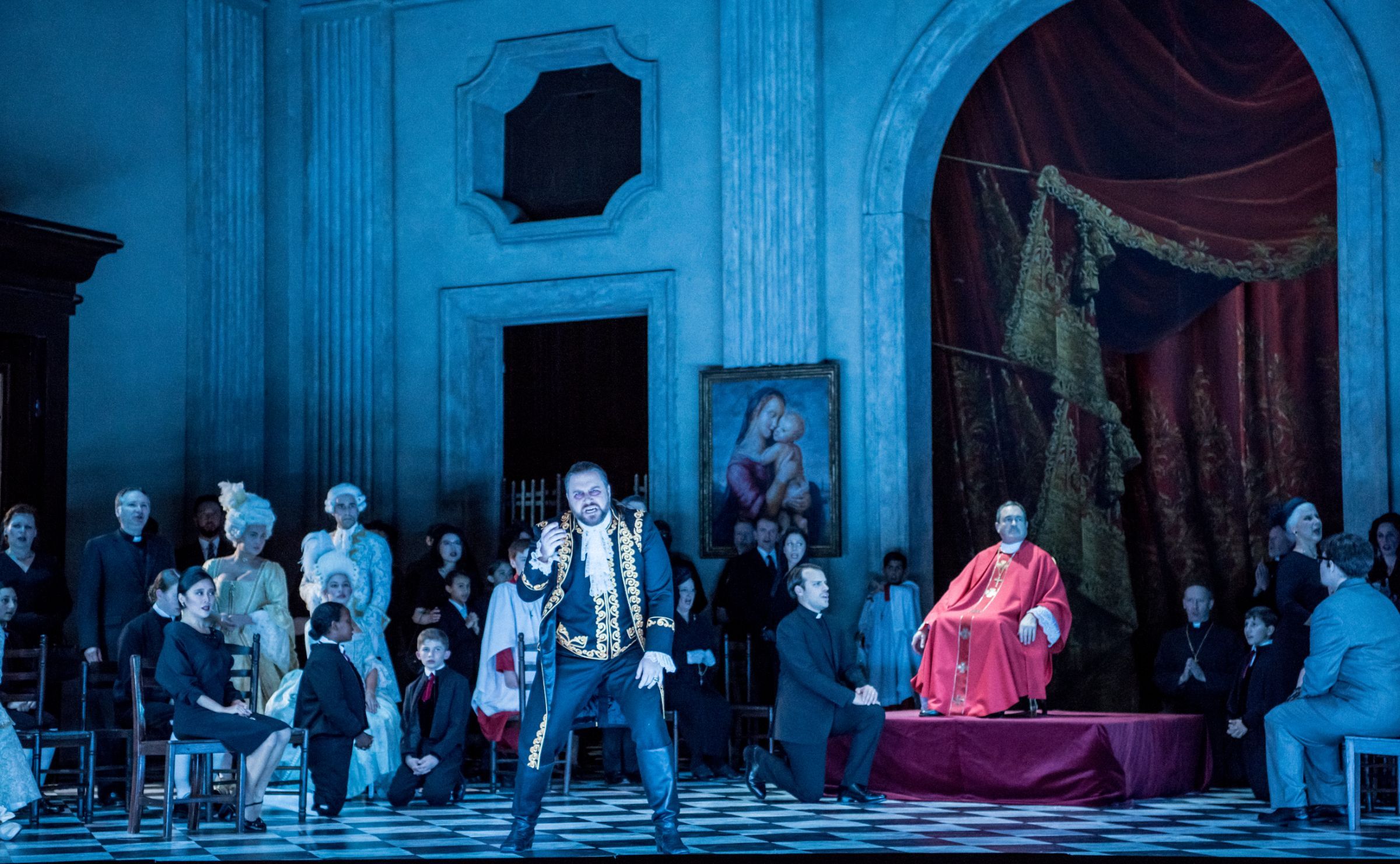 Noel Bouley (Scarpia) and ENO Chorus &copy; Genevieve Girling