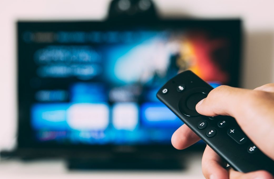 TV and remote © Glenn Carstens-Peters | Unsplash