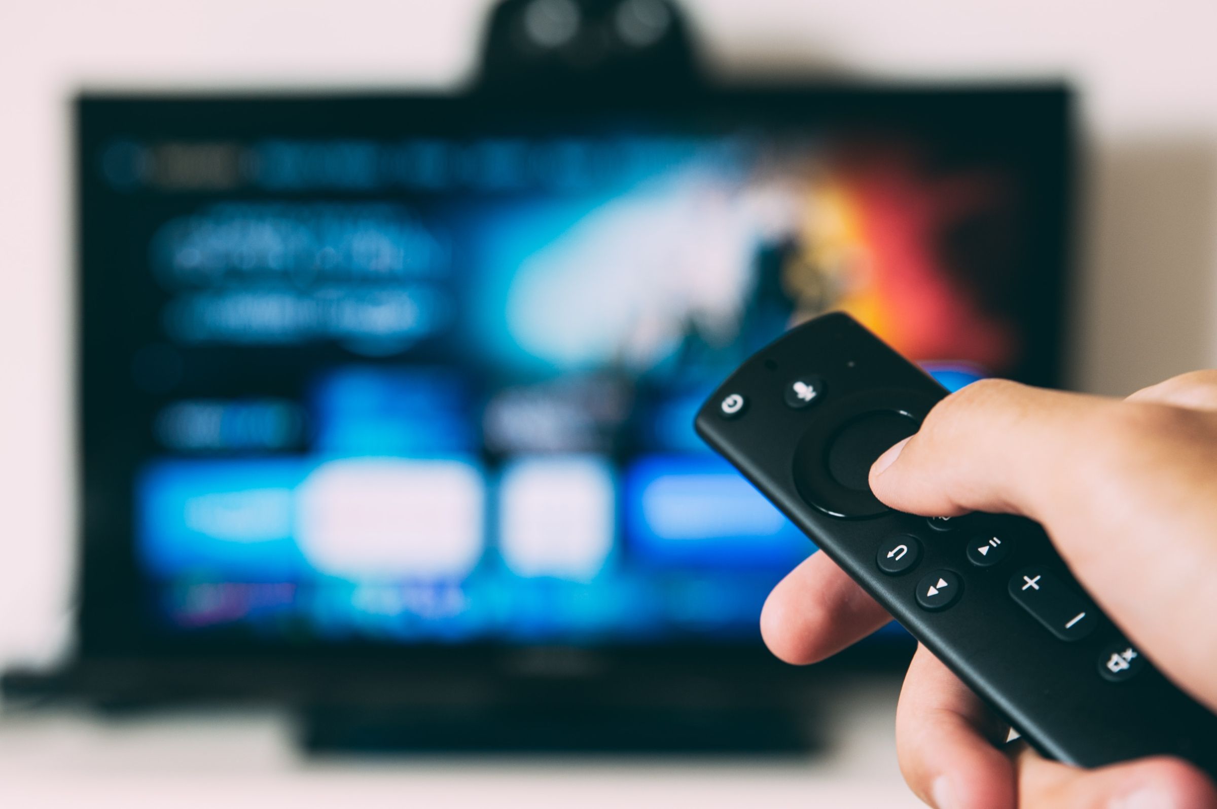 TV and remote © Glenn Carstens-Peters | Unsplash