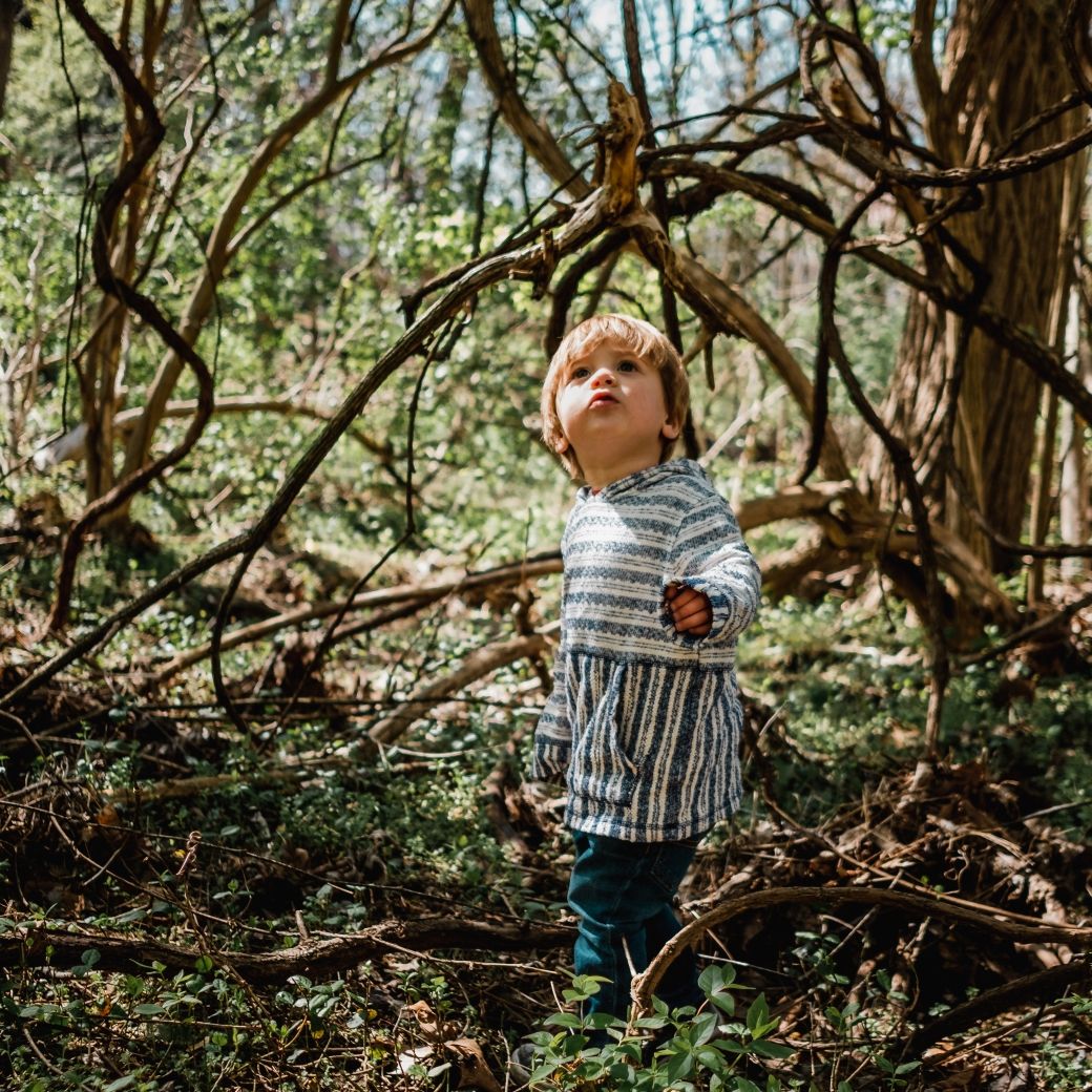 Child in forest &copy; Kyle Nieber | Unsplash