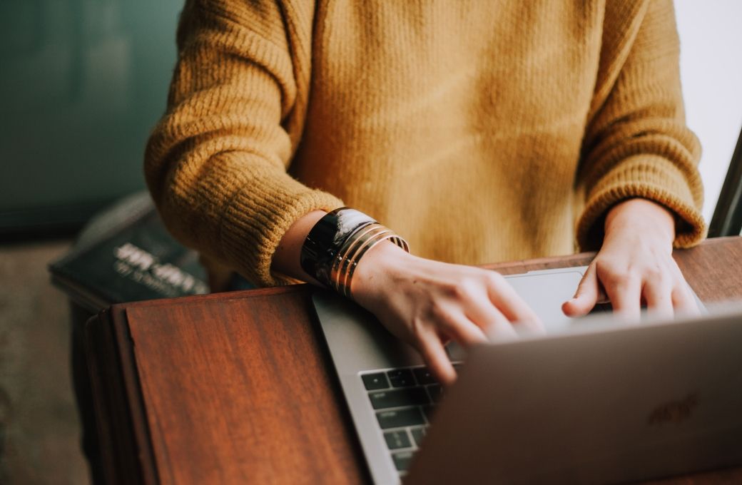 Person on laptop &copy; Christin Hume | Unsplash