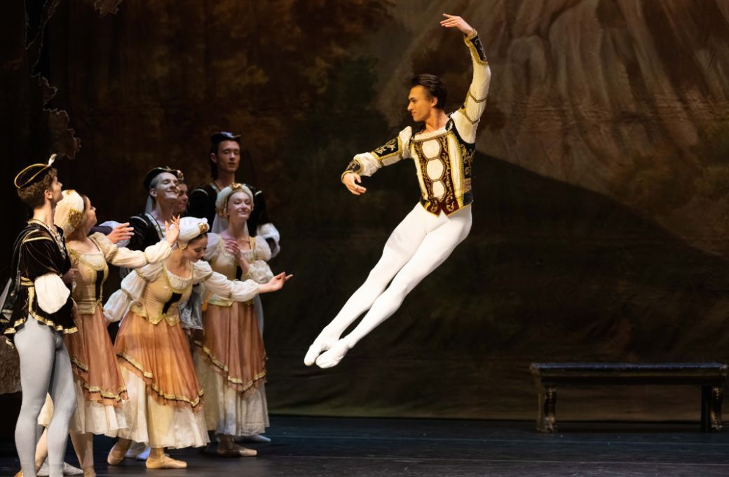 Oleksii Kniazkov (Siegfried) and the corps of The United Ukrainian Ballet &copy; Ben Vella