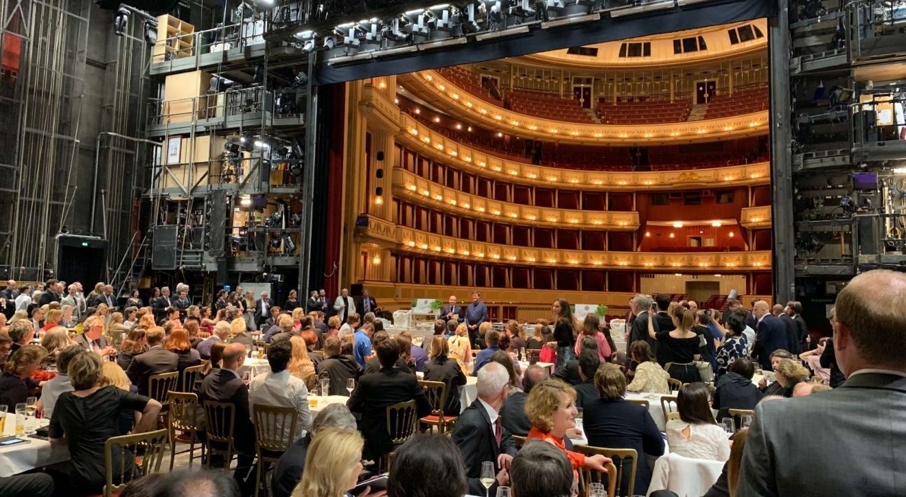 Have a sneak peek behind the curtain onto the stage of the Wiener Staatsoper on their 150th birthday &copy; David Karlin