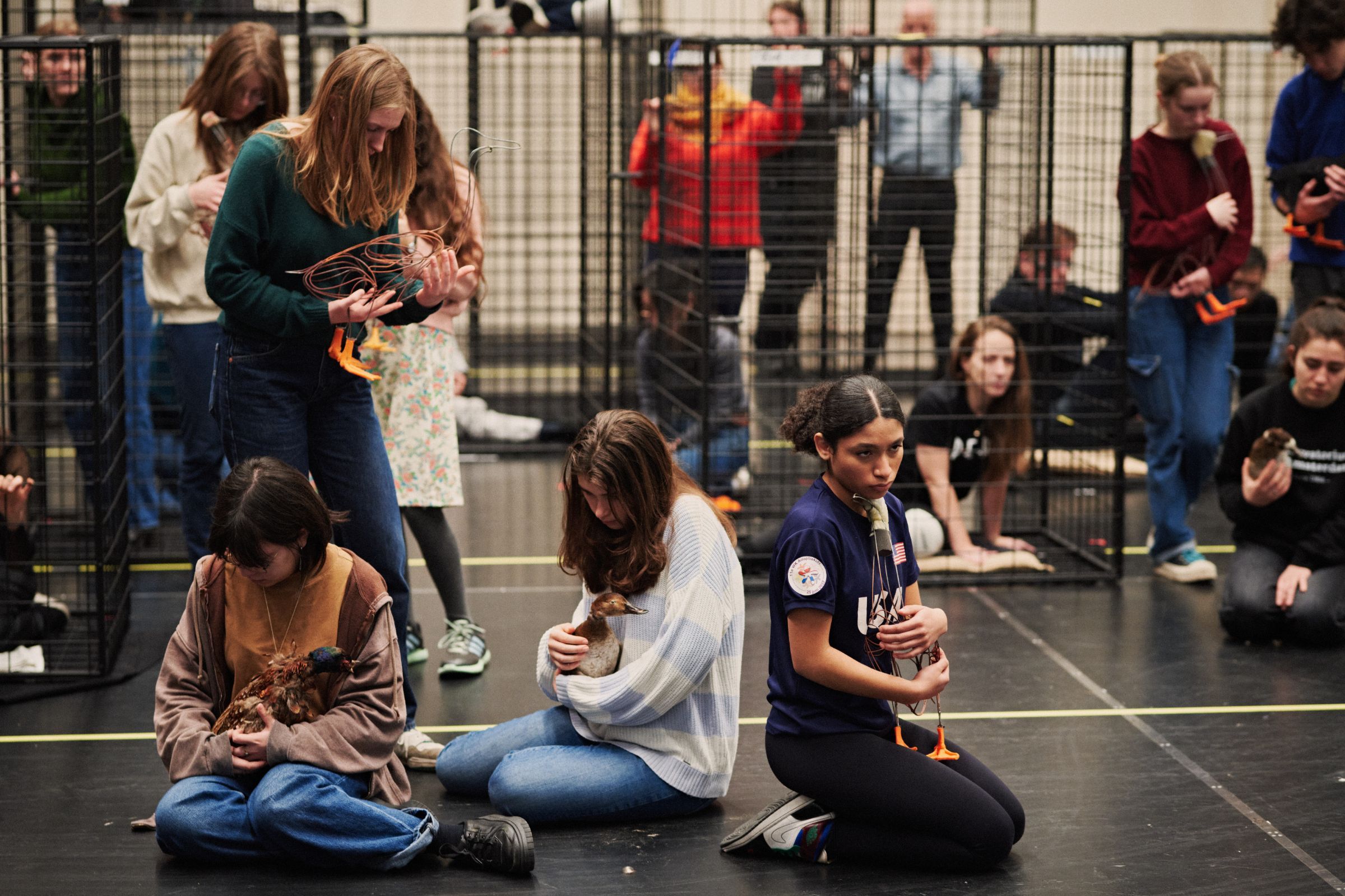 The children’s chorus cradles smaller prop animals &copy; Milagro Elstak