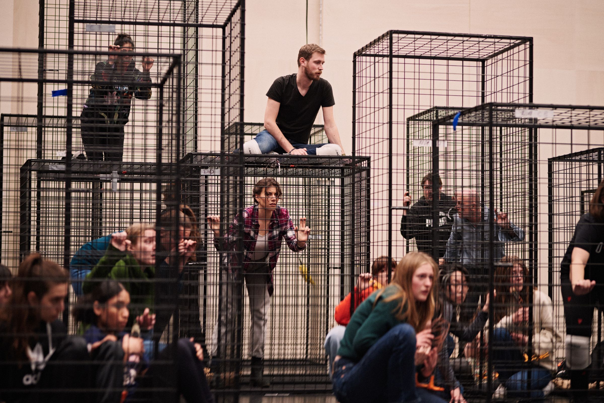 Chorus rehearsing in battery cages &copy; Milagro Elstak