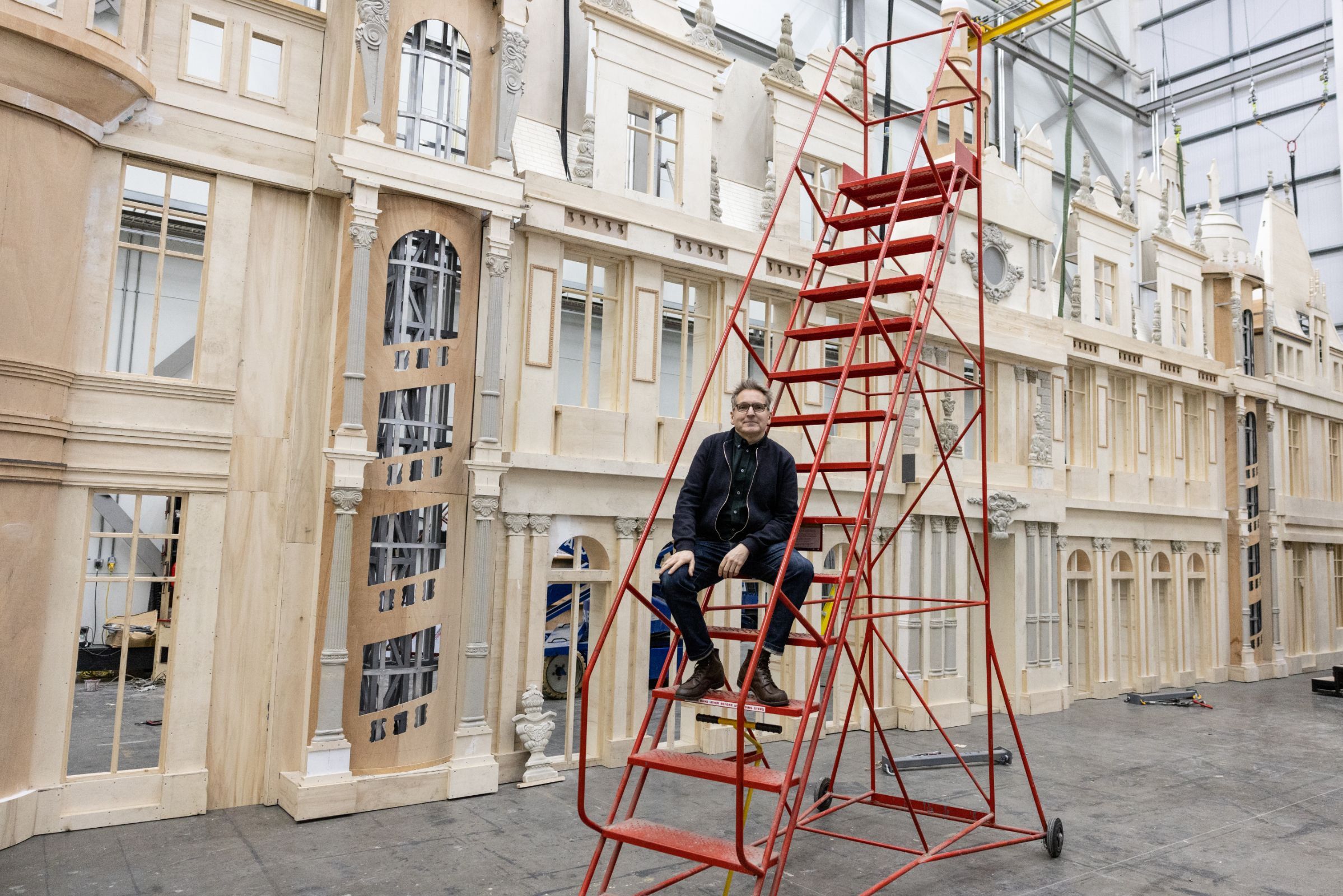 Tom Pye with the Cinderella Palace set at the ROH Production Workshop in Thurrock, January 2023 © Andrej Uspenski