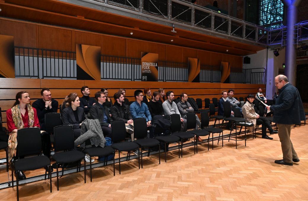 Panel chair David Alberman addresses the twenty participating conductors &copy; Mark Allan | LSO