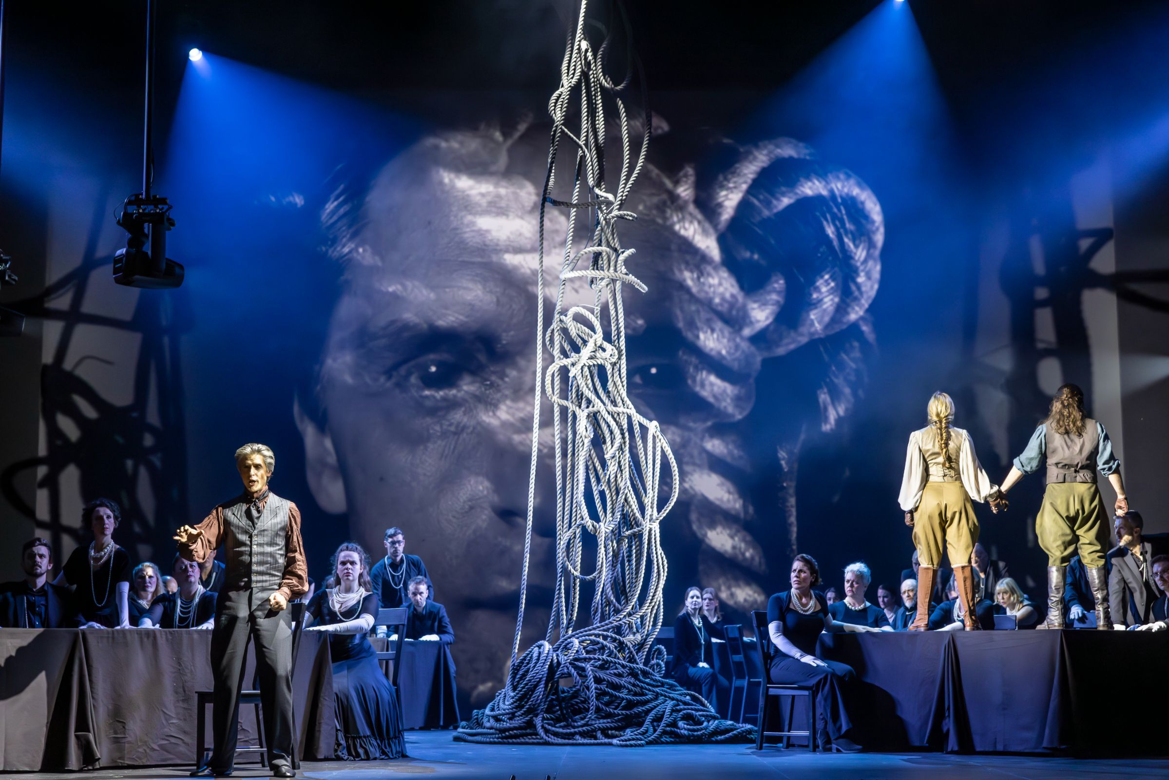Quirijn de Lang, Sophia Theodorides and Nico Darmanin with the Chorus of Opera North © James Glossop