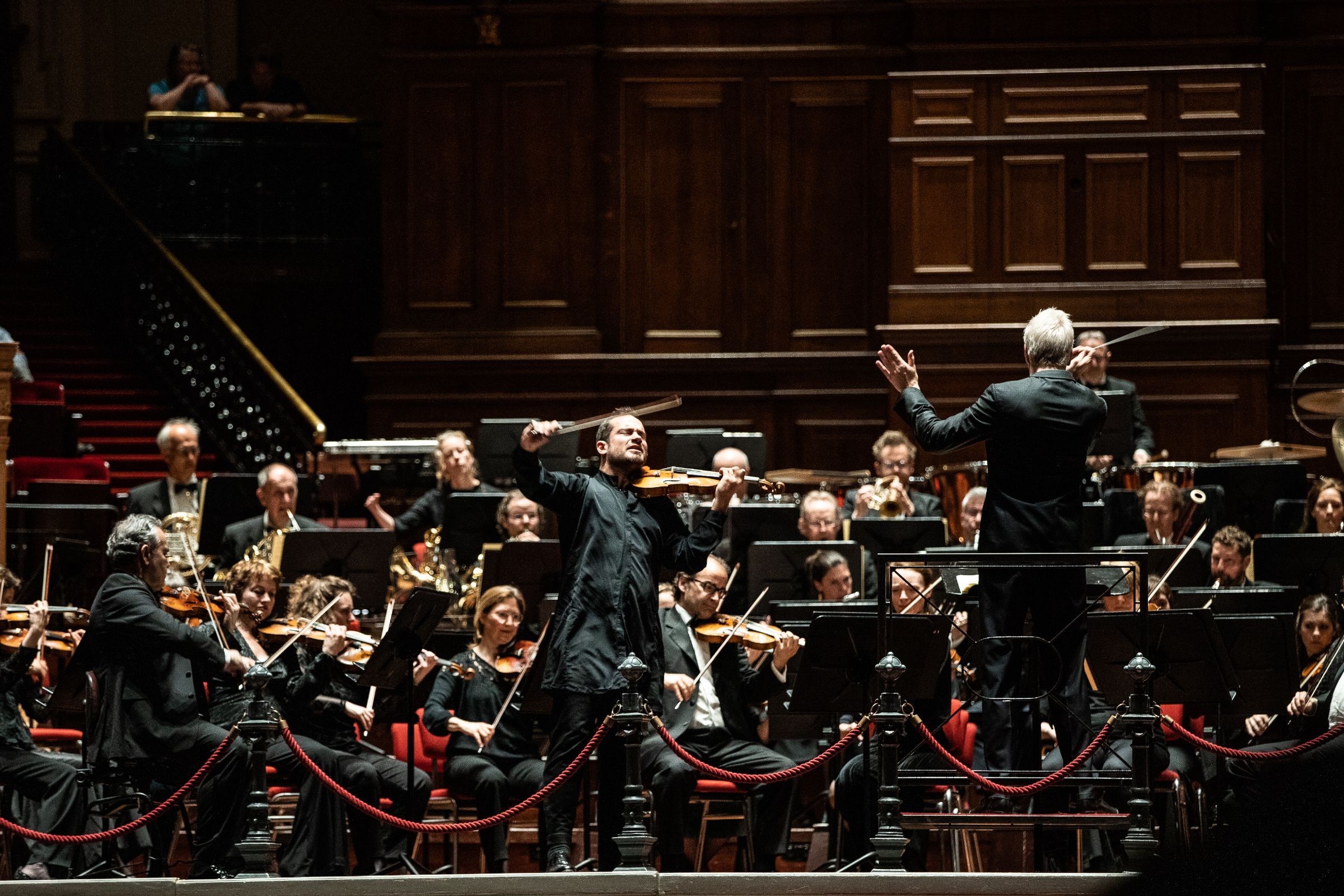 Marc Bouchkov, Hannu Lintu and the Netherlands Philharmonic Orchestra © Melle Meivogel