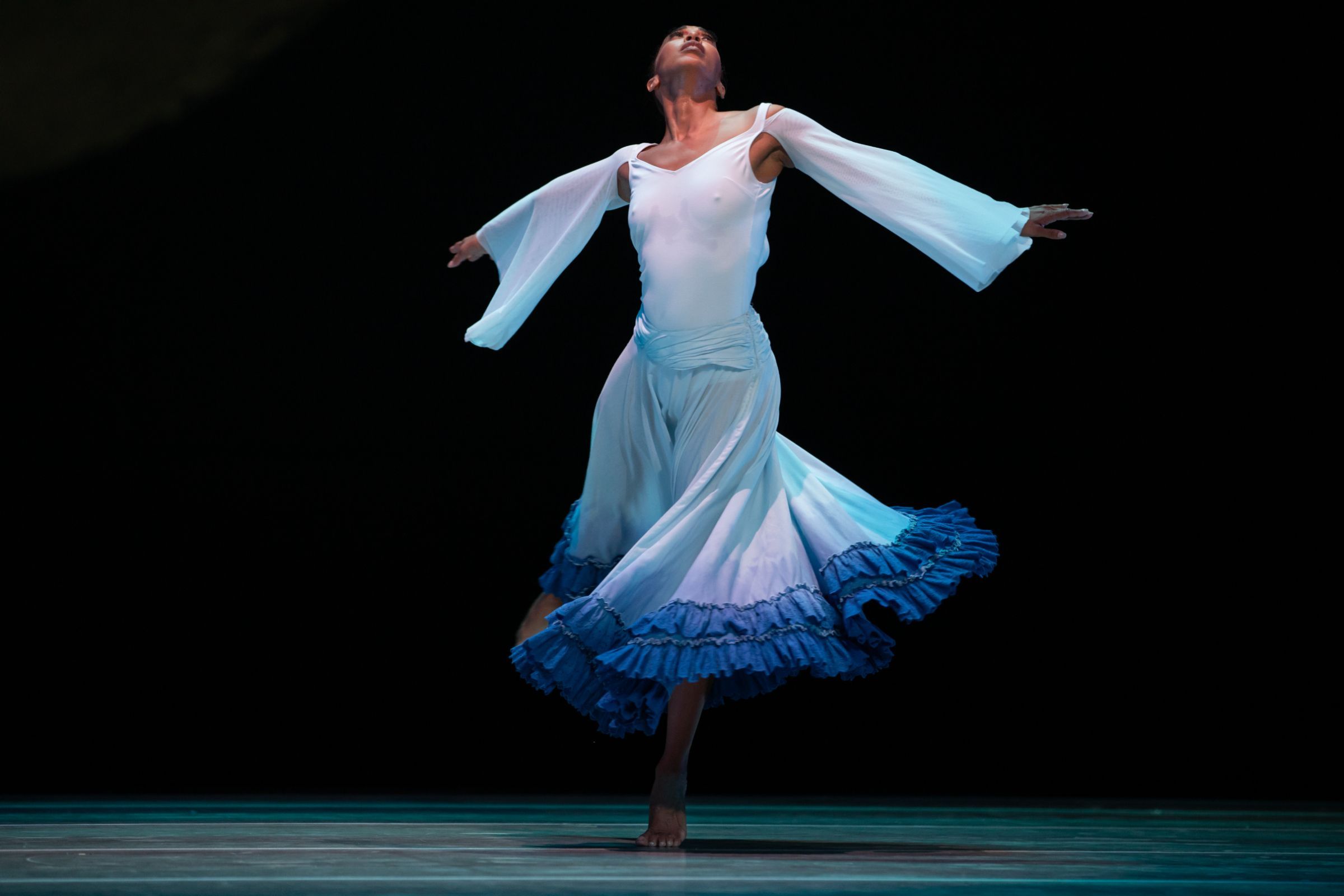 Alvin Ailey American Dance Theater's Constance Stamatiou in Ronald K. Brown's <i>Dancing Spirit</i> © Julieta Cervantes