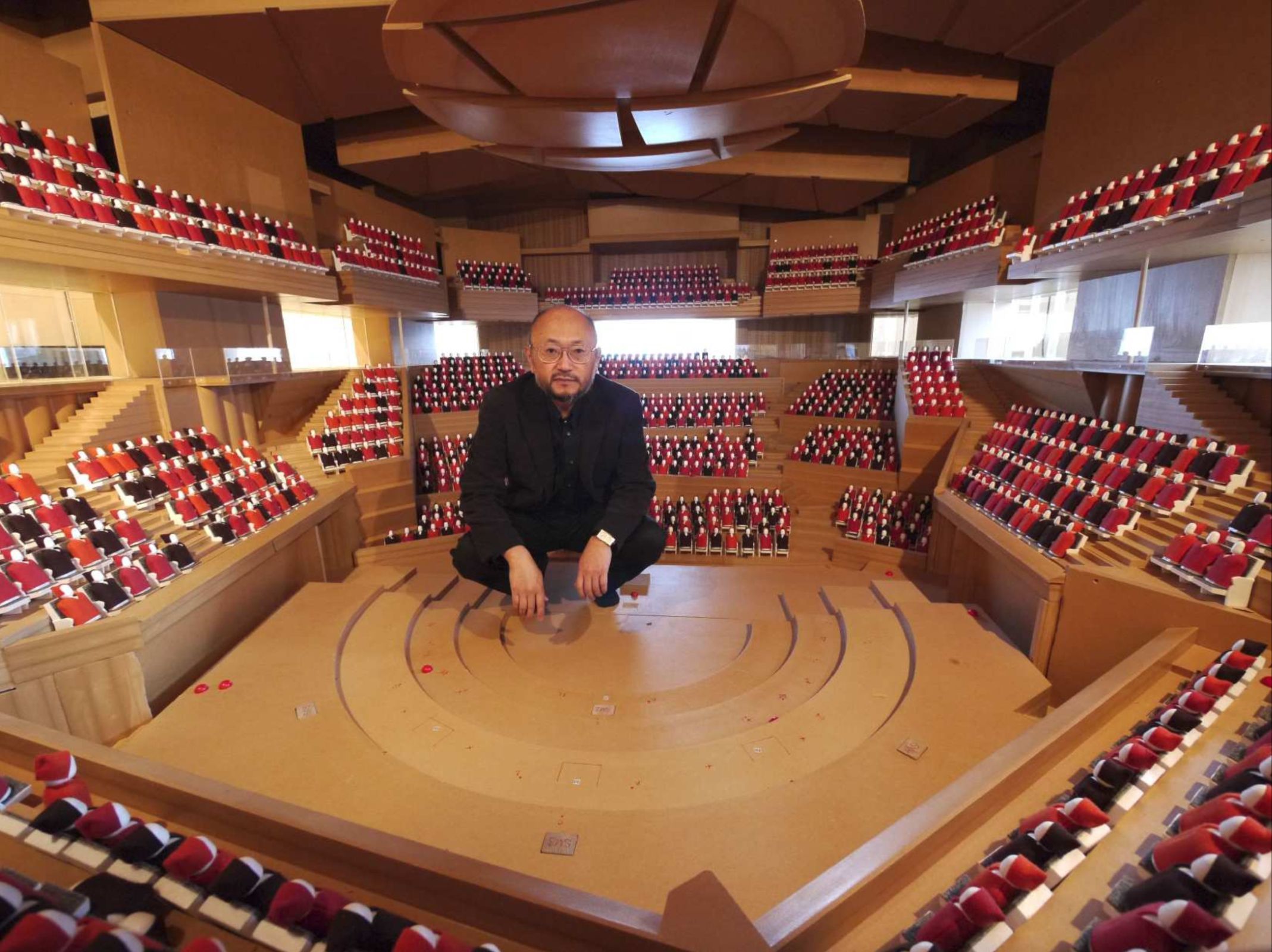 Yasuhisa Toyota in 10:1 scale model of Helsinki Music Centre Concert Hall © Nagata Acoustics