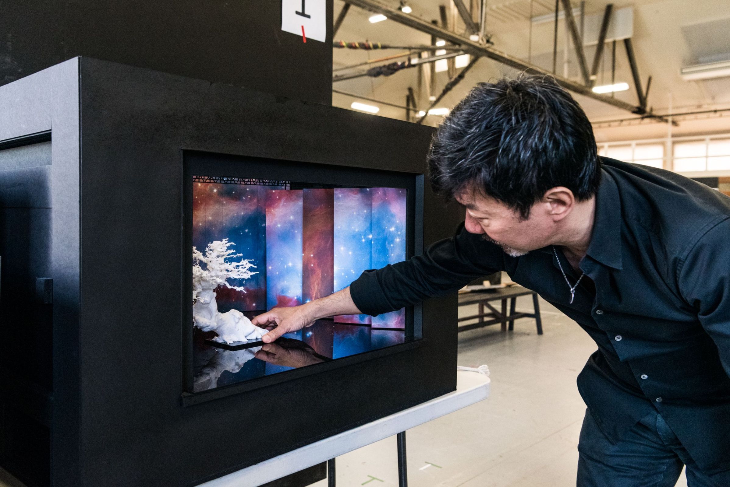 Chen prepares a stage mockup for <i>Die Walküre</i> &copy; Rhiannon Hopley
