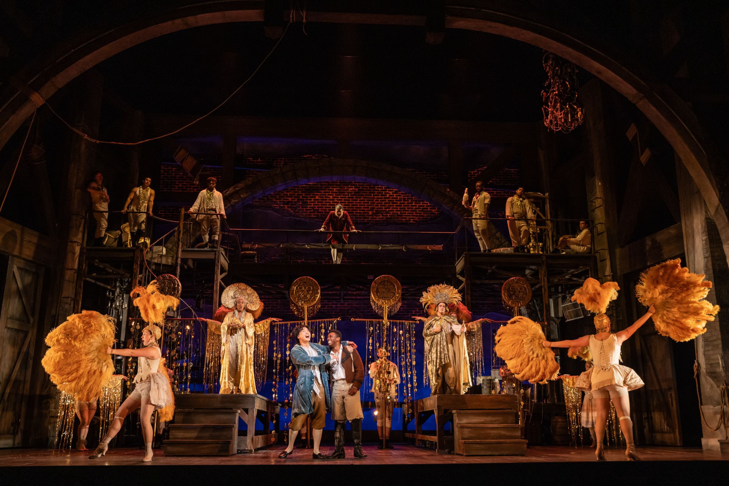 Brian Vu (Candide), Jonathan Pierce Rhodes (Cacambo) and ensemble &copy; Evan Zimmermann
