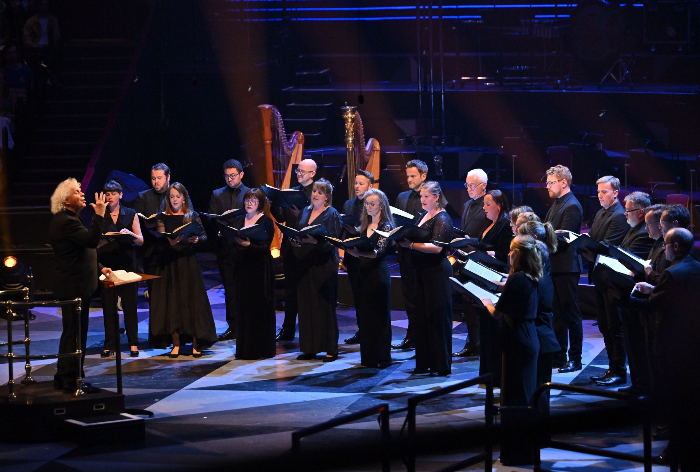 Sir Simon Rattle conducts the BBC Singers © BBC | Mark Allan