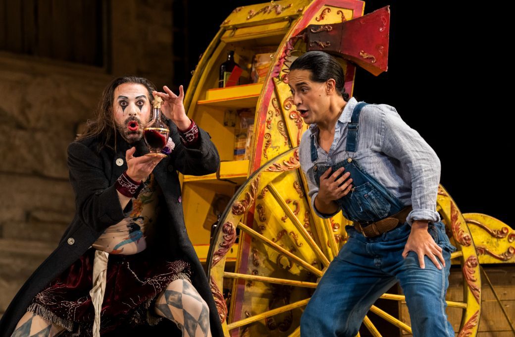 Maxime Nourissat (Dulcamara's assistant) and Filipe Manu (Nemorino) &copy; Glyndebourne Productions Ltd. Photo: Tristram Kenton
