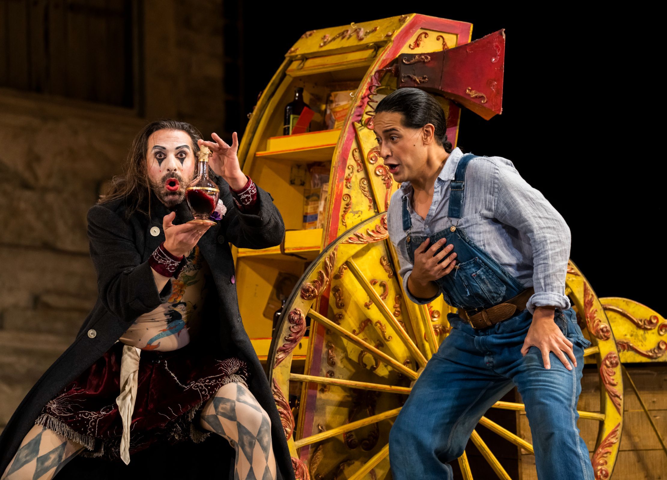 Maxime Nourissat (Dulcamara's assistant) and Filipe Manu (Nemorino) &copy; Glyndebourne Productions Ltd. Photo: Tristram Kenton