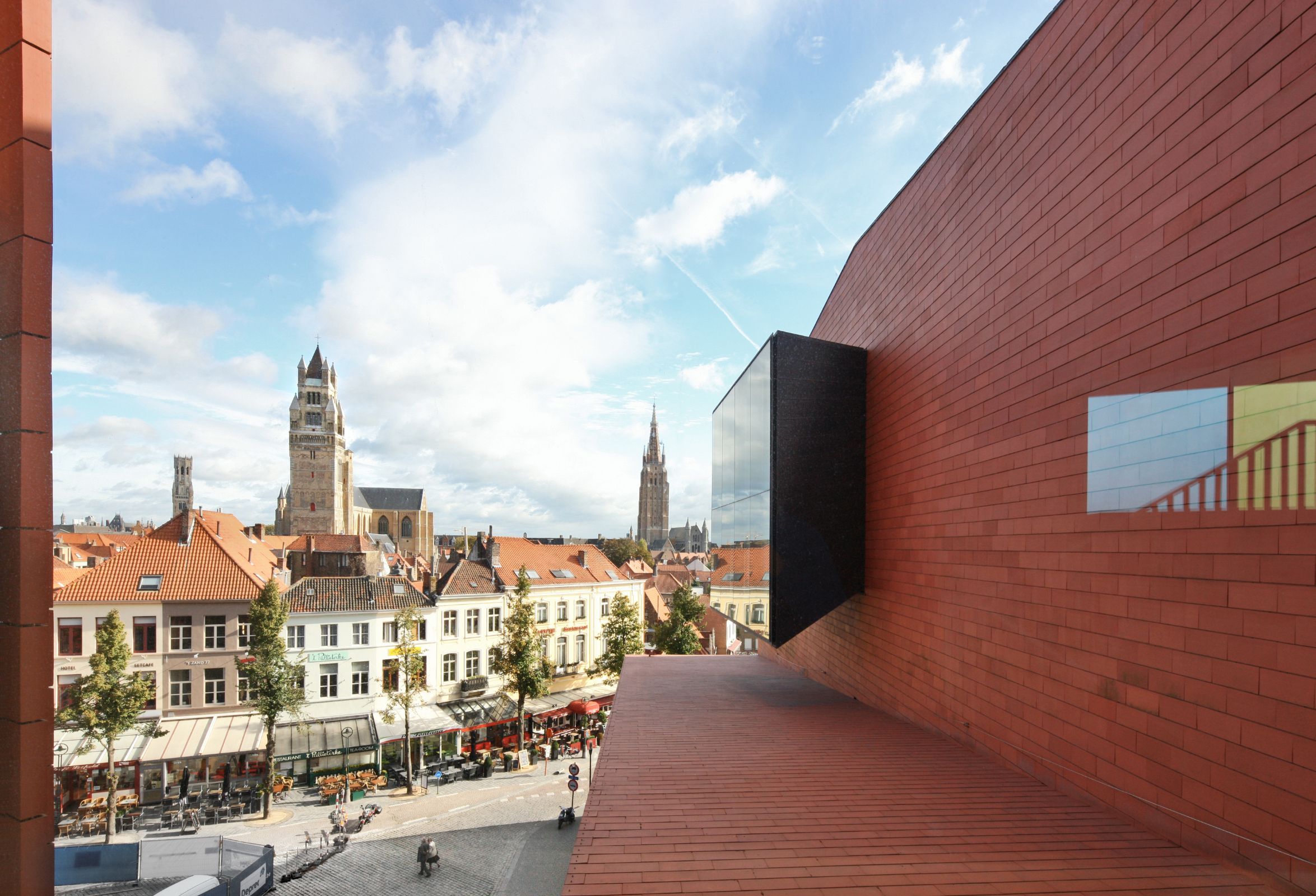 The Concertgebouw’s terracotta against the medieval city &copy; Filip Dujardin