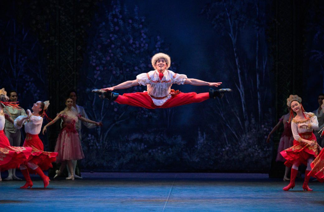 Erik Woolhouse in the Cossak dance in Wayne Eagling's <i>Nutcracker</i> © Laurent Liotardo