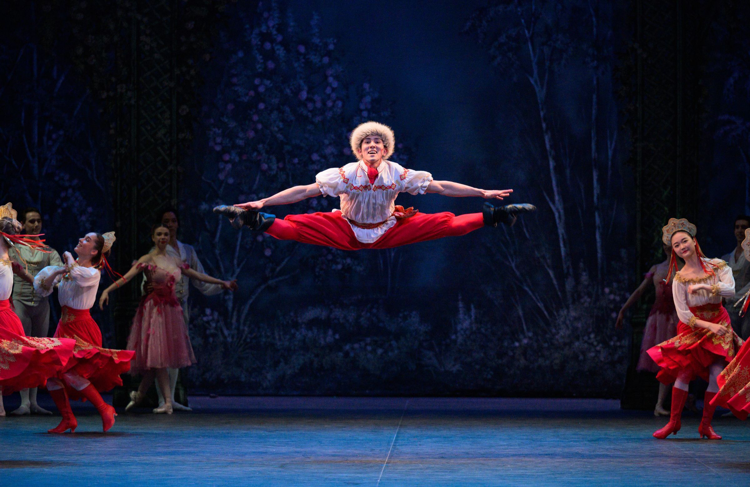 Erik Woolhouse in the Cossak dance in Wayne Eagling's <i>Nutcracker</i> © Laurent Liotardo