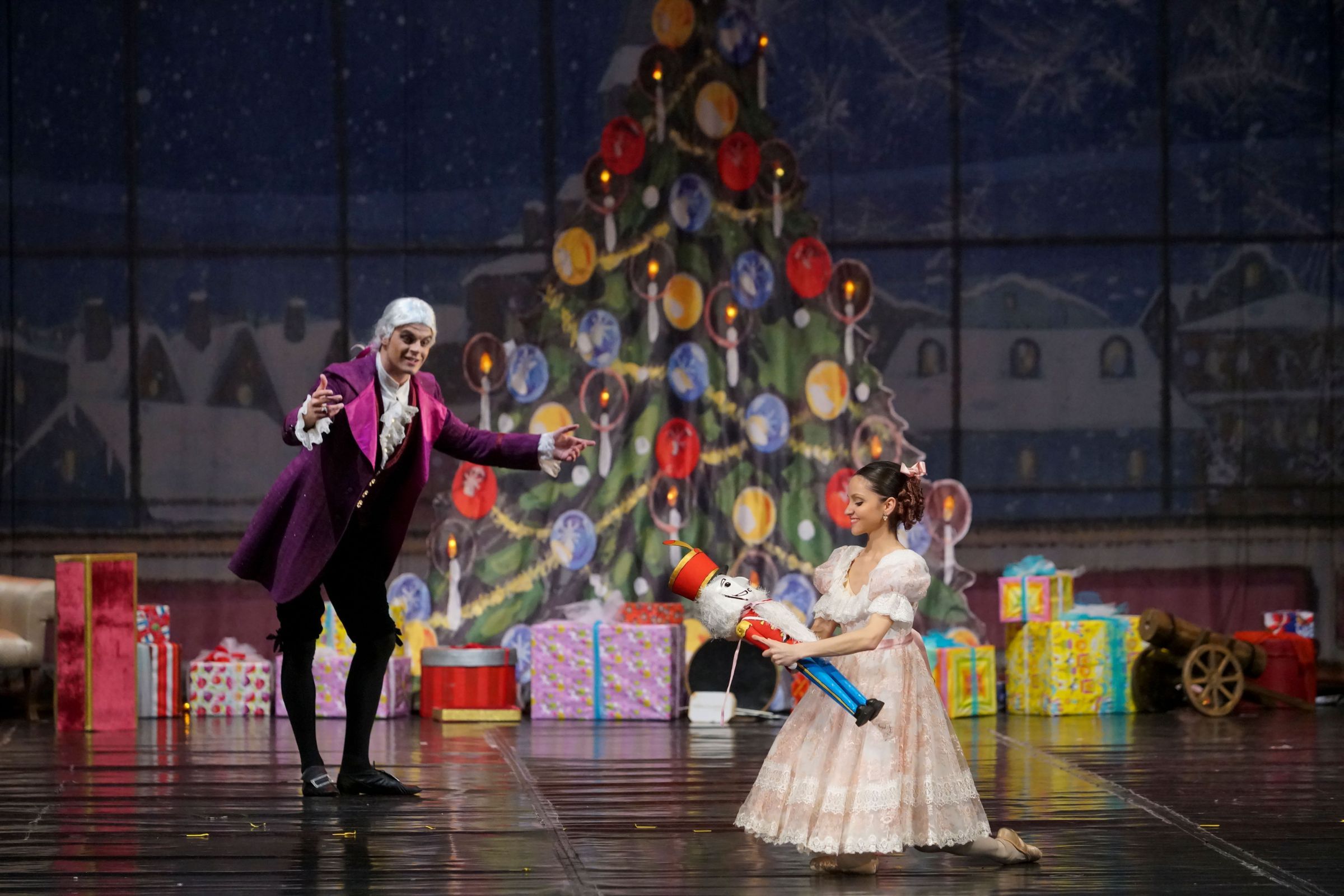 Ivaylo Yanev as Drosselmeyer and Carmen Demirtash as Marie in <i>The Nutcracker</i> © Ballet of the State Opera Stara Zagora Bulgary