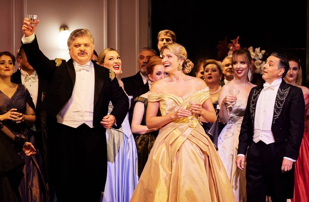 Andrew Moran (Marquis d'Obigny), Samantha Clarke (Violetta) and Virgilio Marino (Gastone) &copy; Keith Saunders