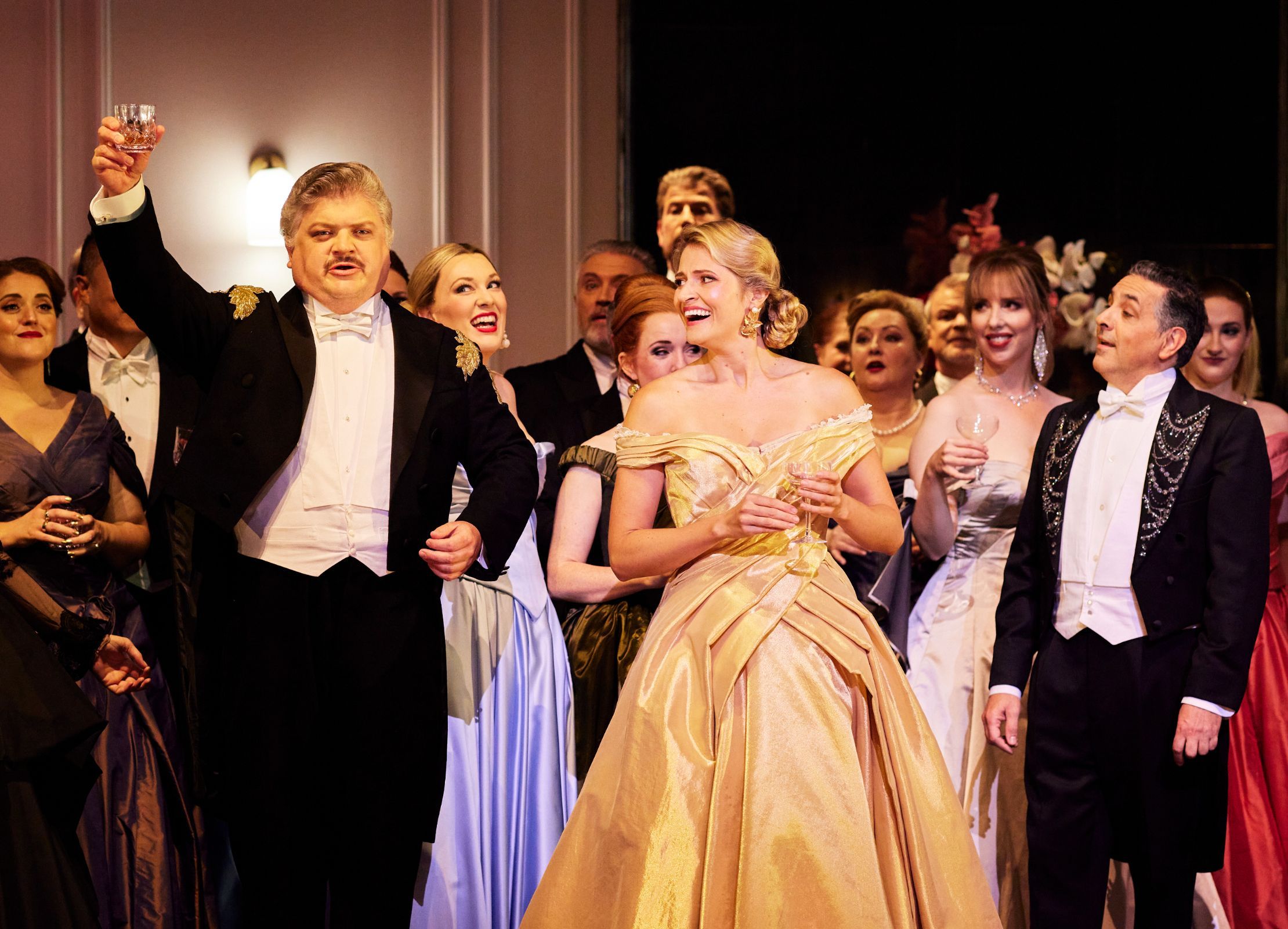 Andrew Moran (Marquis d'Obigny), Samantha Clarke (Violetta) and Virgilio Marino (Gastone) &copy; Keith Saunders