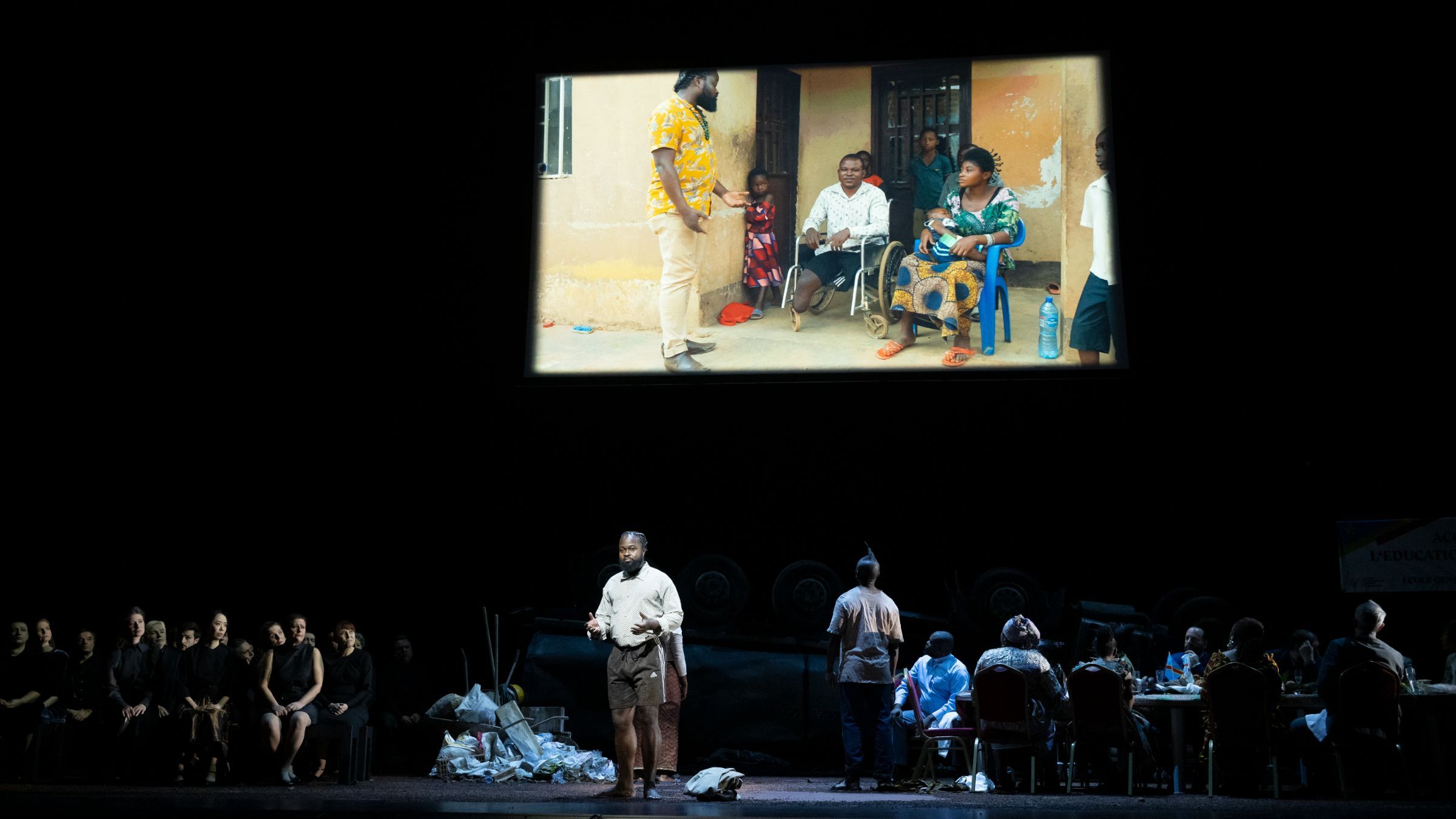 <i>Justice</i>, showing video of Serge Kakudji visiting victims &copy; Grand Théâtre de Genève | Carole Parodi