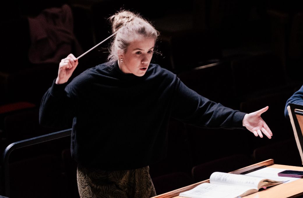 Charlotte Corderoy rehearsing the Royal Philharmonic Orchestra © Tim Lutton