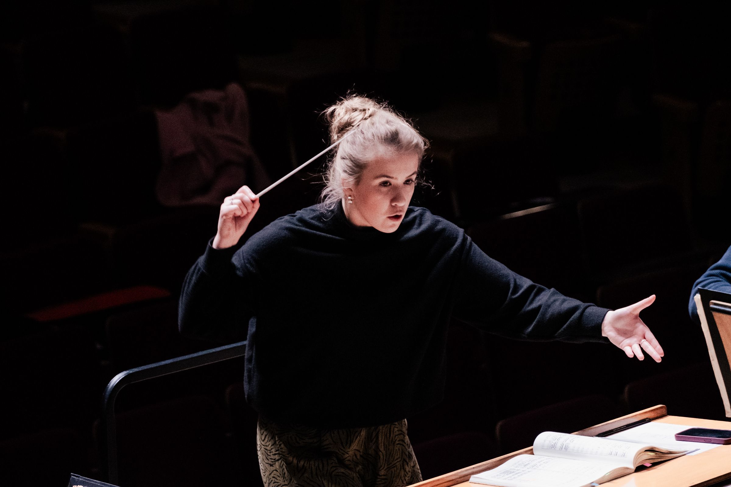 Charlotte Corderoy rehearsing the Royal Philharmonic Orchestra © Tim Lutton