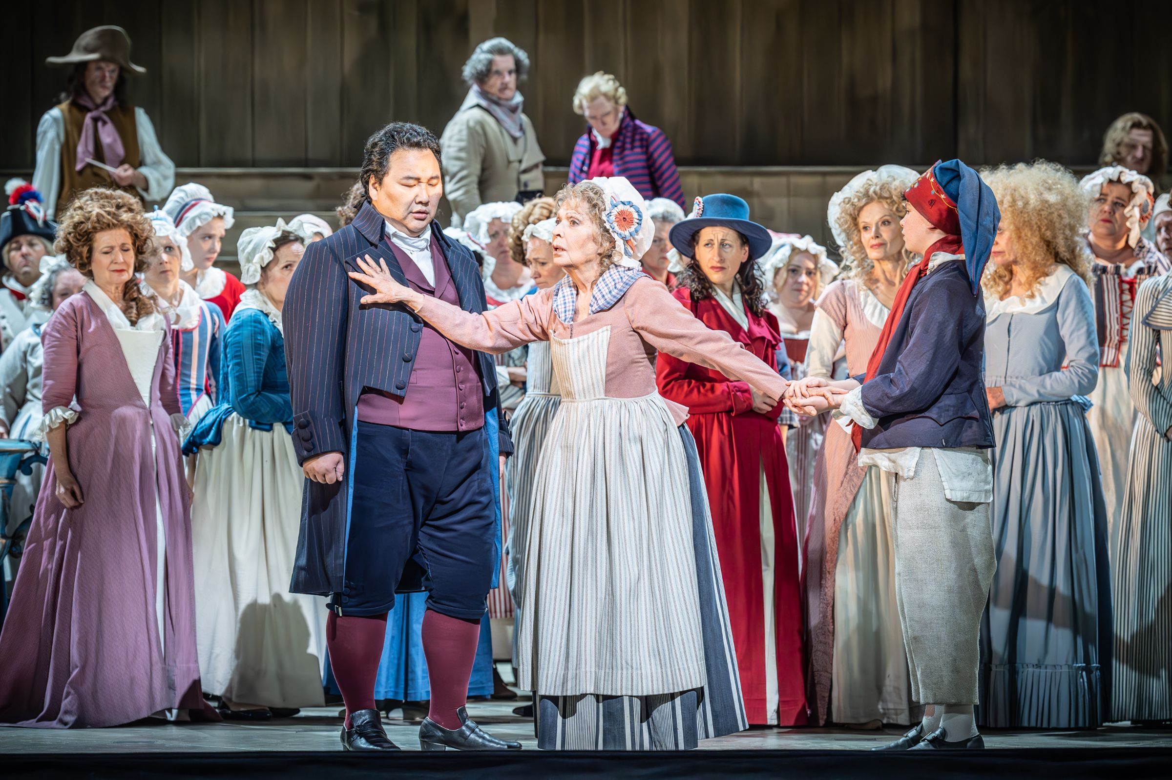 Amartuvshin Enkhbat (Carlo Gérard), Elena Zilio (Madelon) and chorus &copy; ROH | Marc Brenner