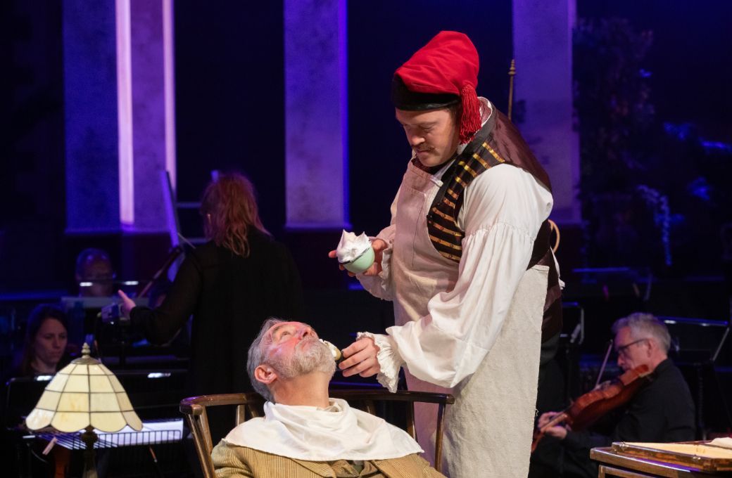 Stephen Gadd (Dr Bartolo) and Paul Grant (Figaro) © Ali Wright