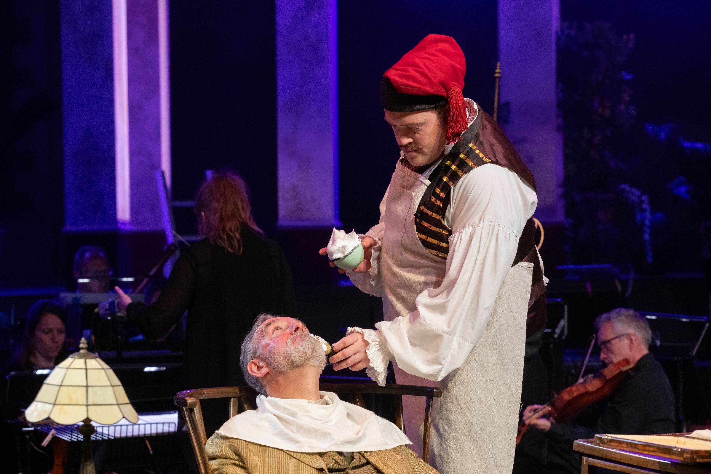 Stephen Gadd (Dr Bartolo) and Paul Grant (Figaro) © Ali Wright