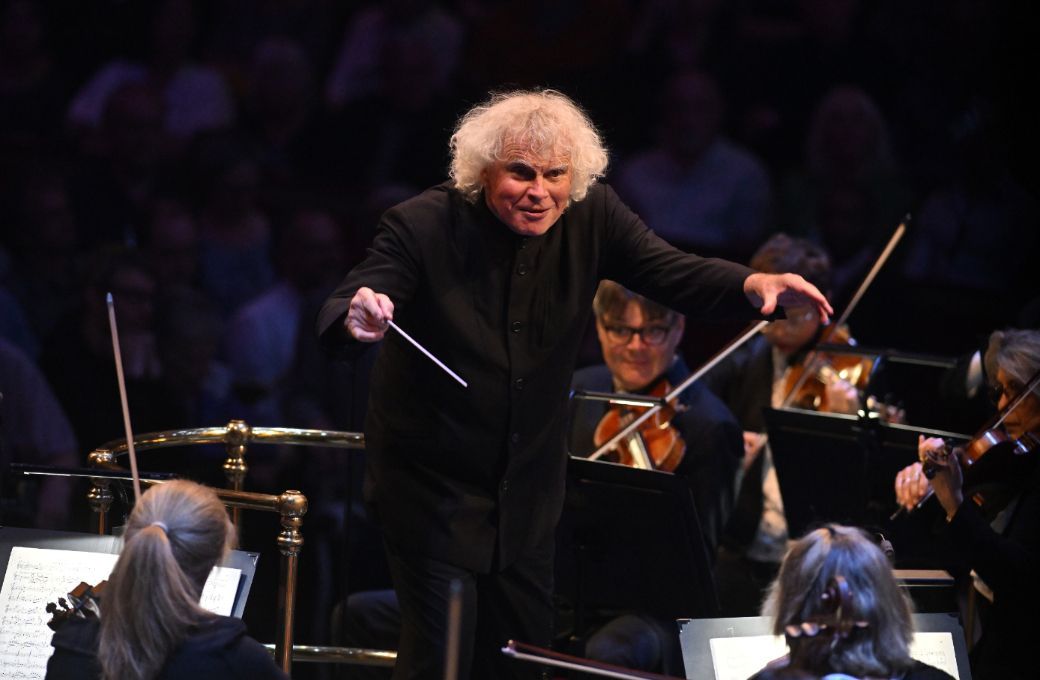 Sir Simon Rattle conducts at the BBC Proms &copy; Mark Allan