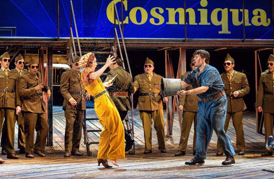Cadie J Bryan (Giannetta), Jonah Hoskins (Nemorino) and the Santa Fe Opera Chorus &copy; Curtis Brown Photography