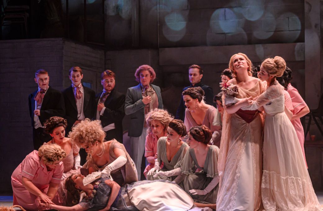 Sarah Richmond (Olga), Mary McCabe (Tatyana) and chorus &copy; Neil Harrison Photography | Northern Ireland Opera