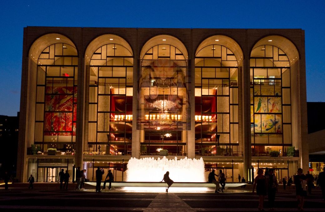 The Metropolitan Opera House at Lincoln Center Plaza, at dusk. &copy; Jonathan Tichler/Metropolitan Opera