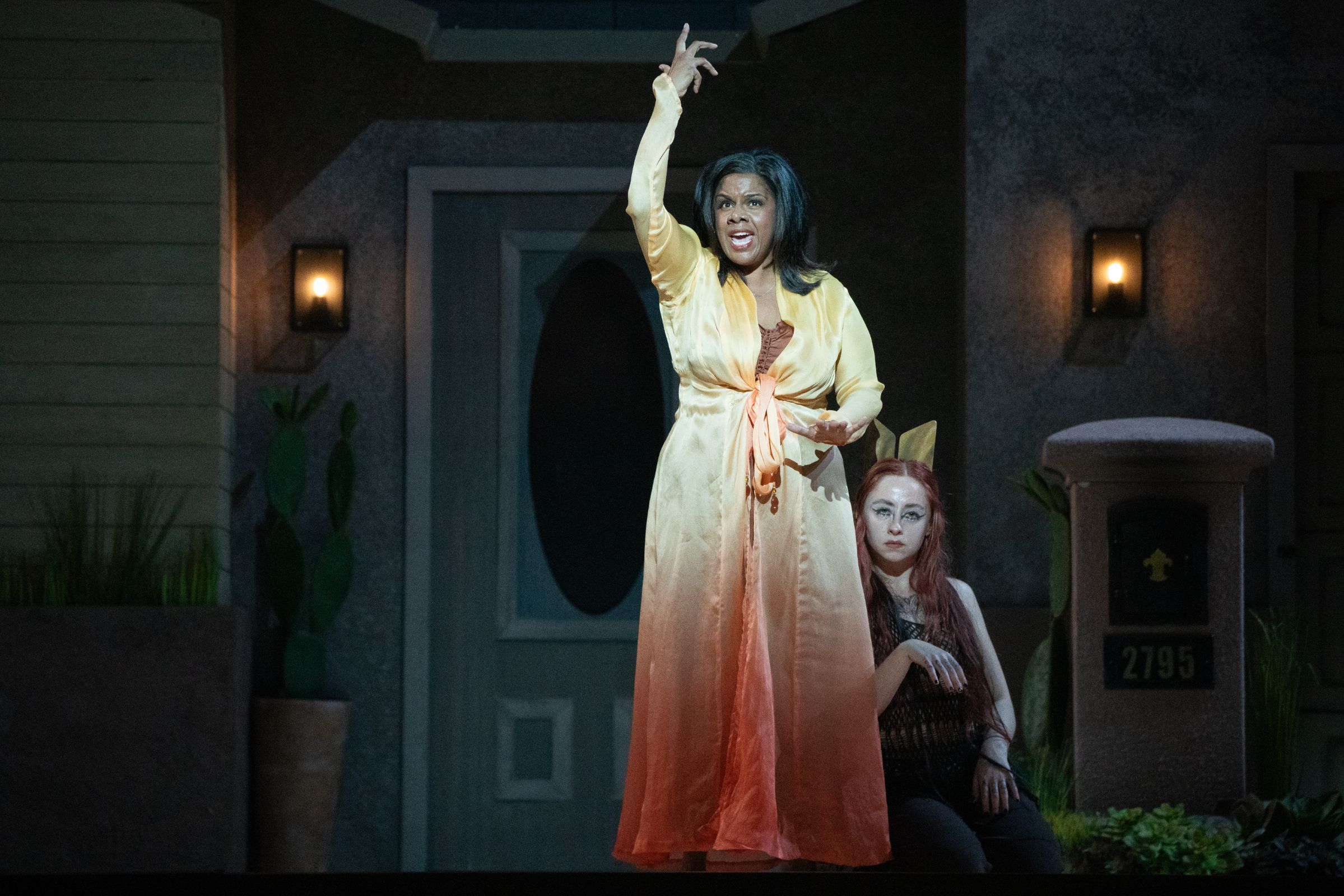 Nicole Heaston (Claire Devon) and dancer Sydney Donovan as the Coyote &copy; Steven Pisano