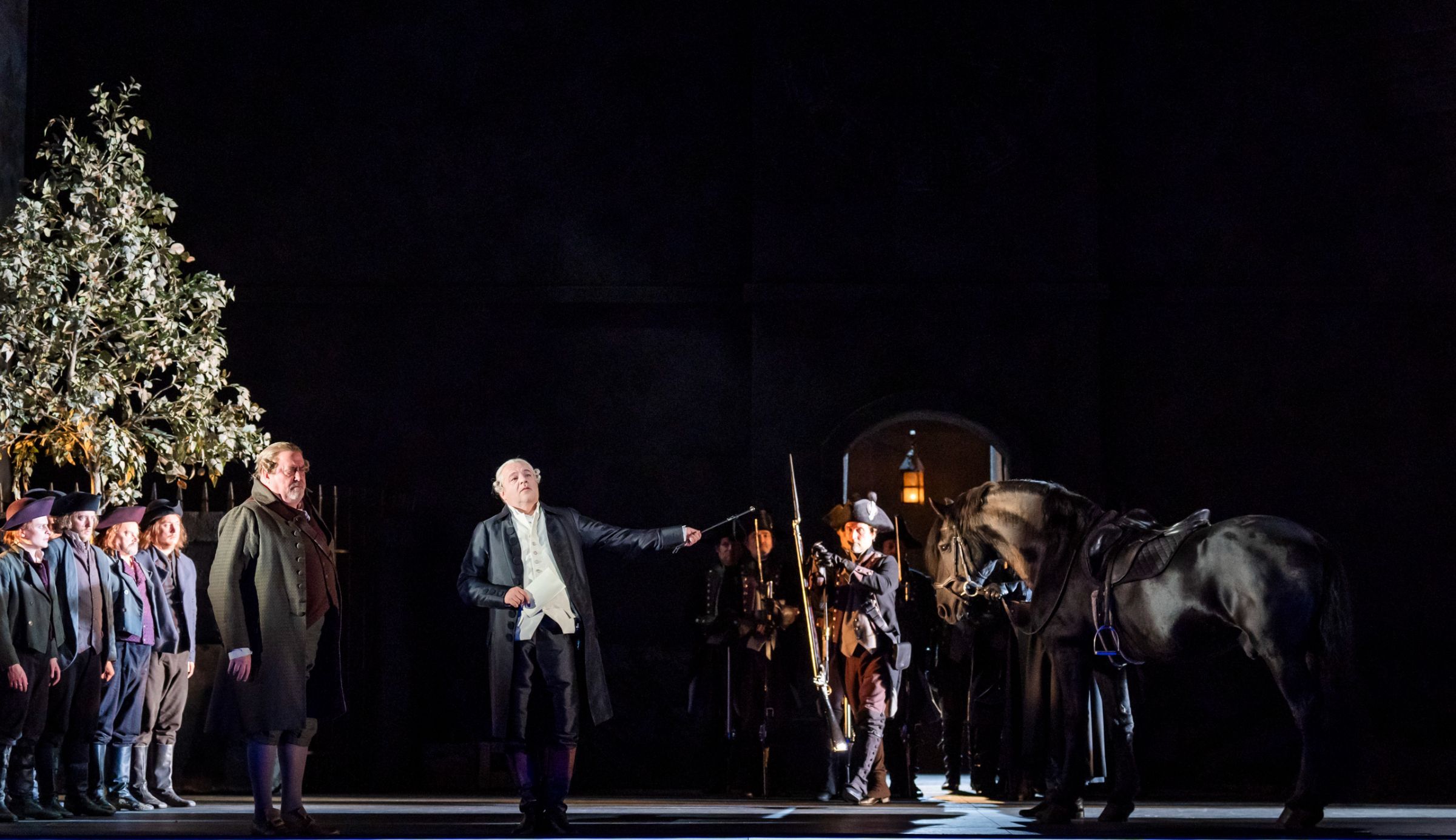 Peter Rose (Rocco), Jochen Schmeckenbecher (Don Pizarro) and chorus &copy; Tristram Kenton, 2024