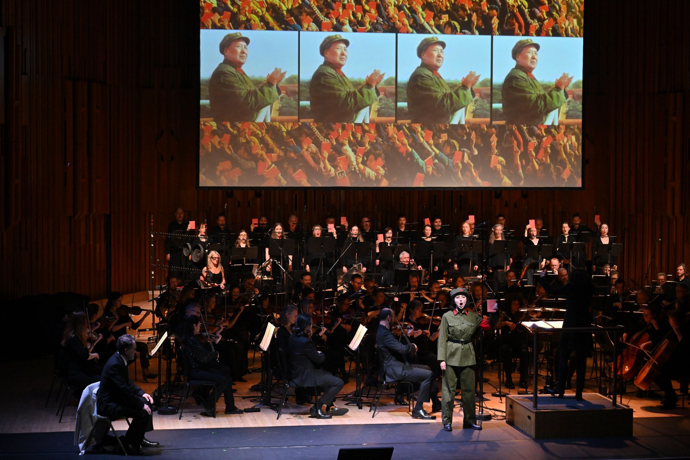 Mark Stone (Gallimard), Fleur Barron (Comrade Chin), the BBCSO and BBC Singers © BBC | Mark Allan