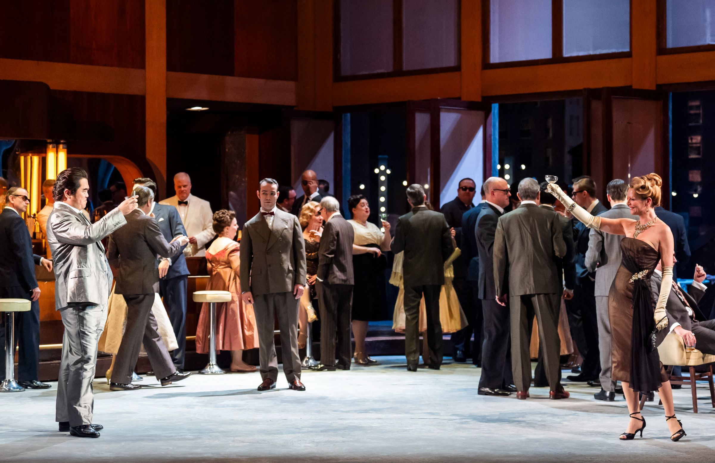 Yongzhao Yu (Duke), Joanne Appleby (Countess Ceprano) and ENO Chorus © Tristram Kenton