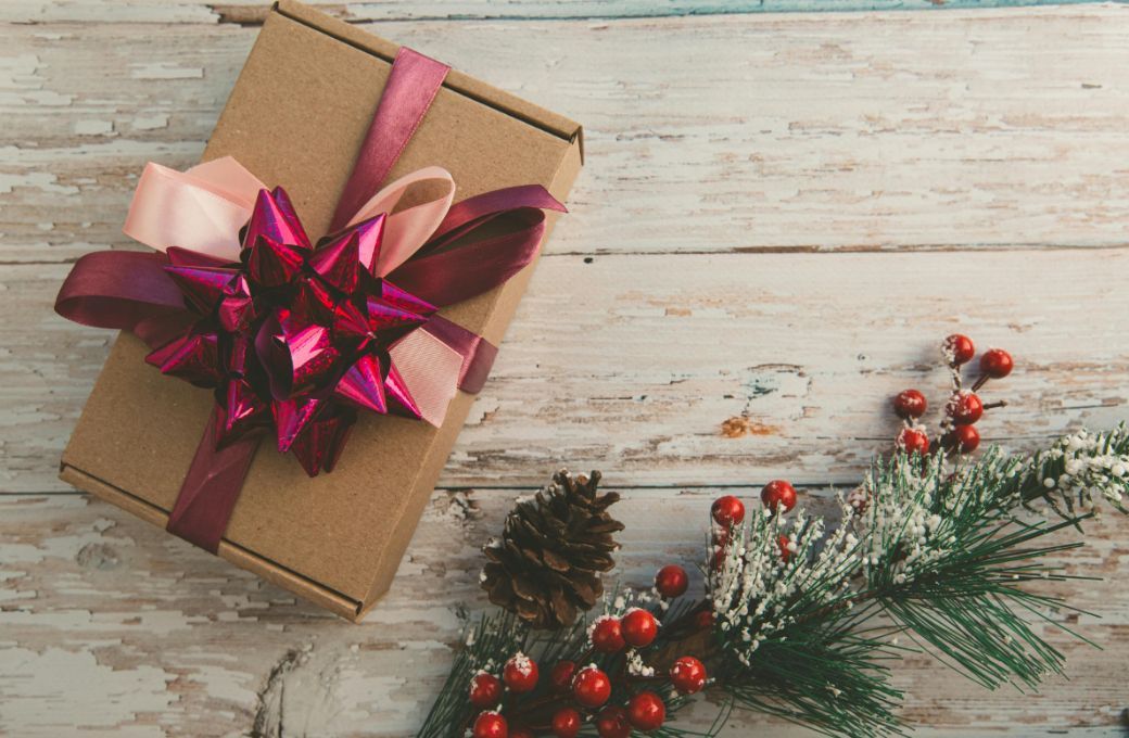 Christmas gift with decorative fir tree © Victoria Emerson