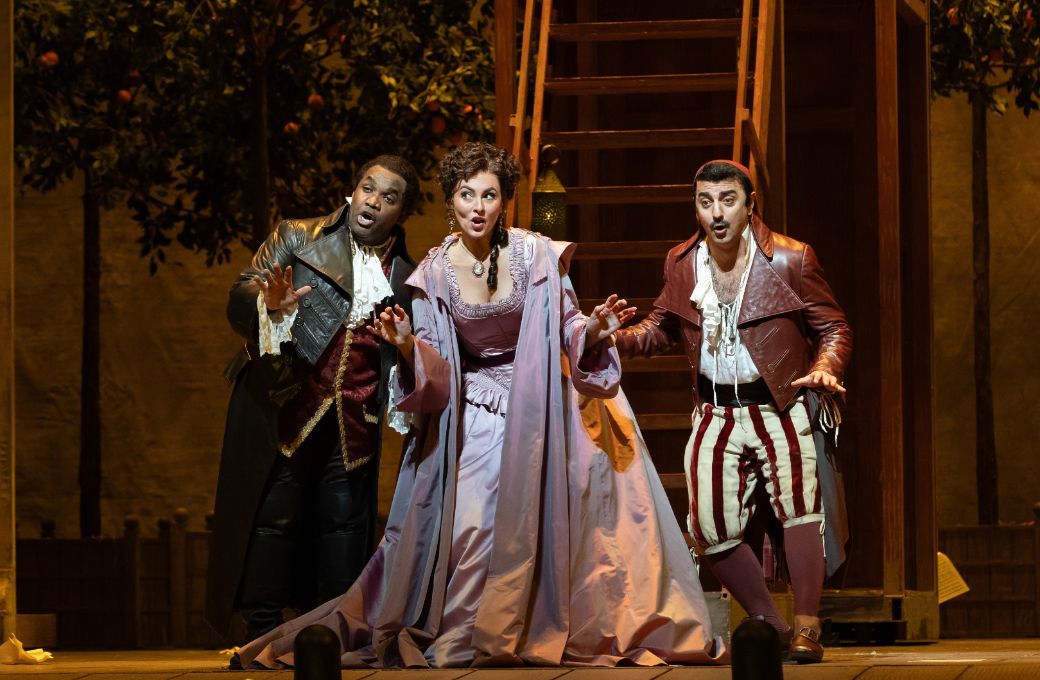 Lawrence Brownlee (Count Almaviva), Isabel Leonard (Rosina) and Davide Luciano (Figaro) &copy; Marty Sohl | Met Opera