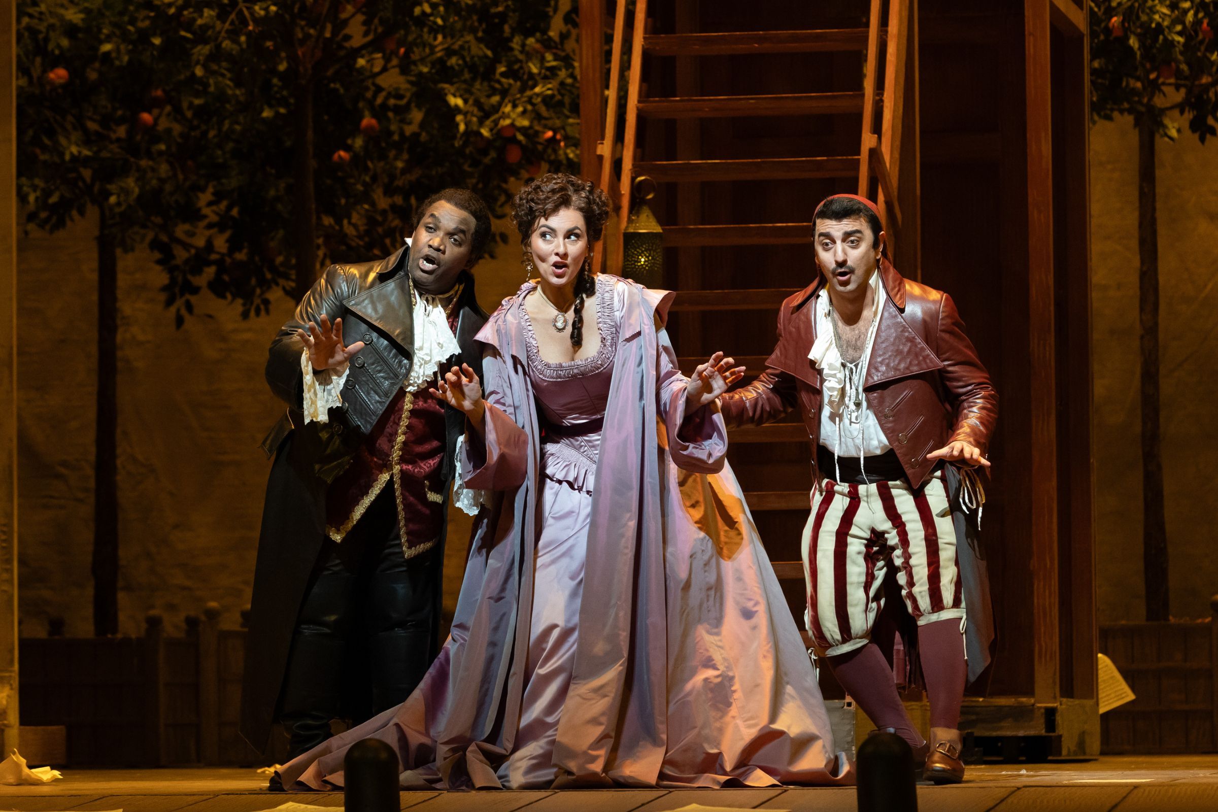Lawrence Brownlee (Count Almaviva), Isabel Leonard (Rosina) and Davide Luciano (Figaro) &copy; Marty Sohl | Met Opera