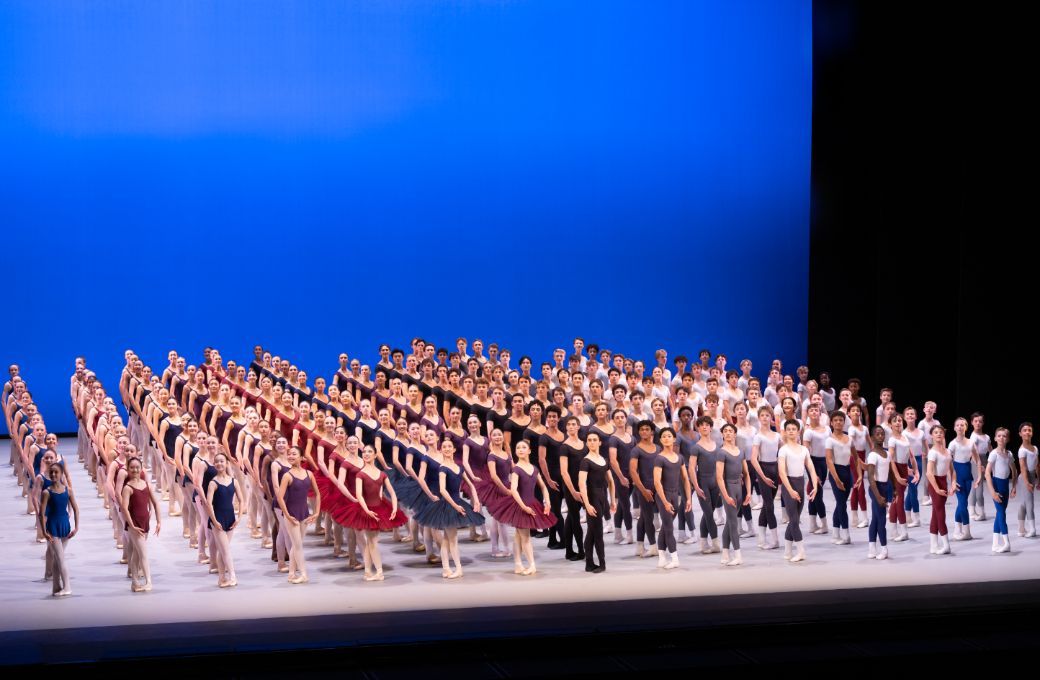 The whole School in <i>Grand Défilé</i> &copy; 2025 The Royal Ballet School. Photography by ASH