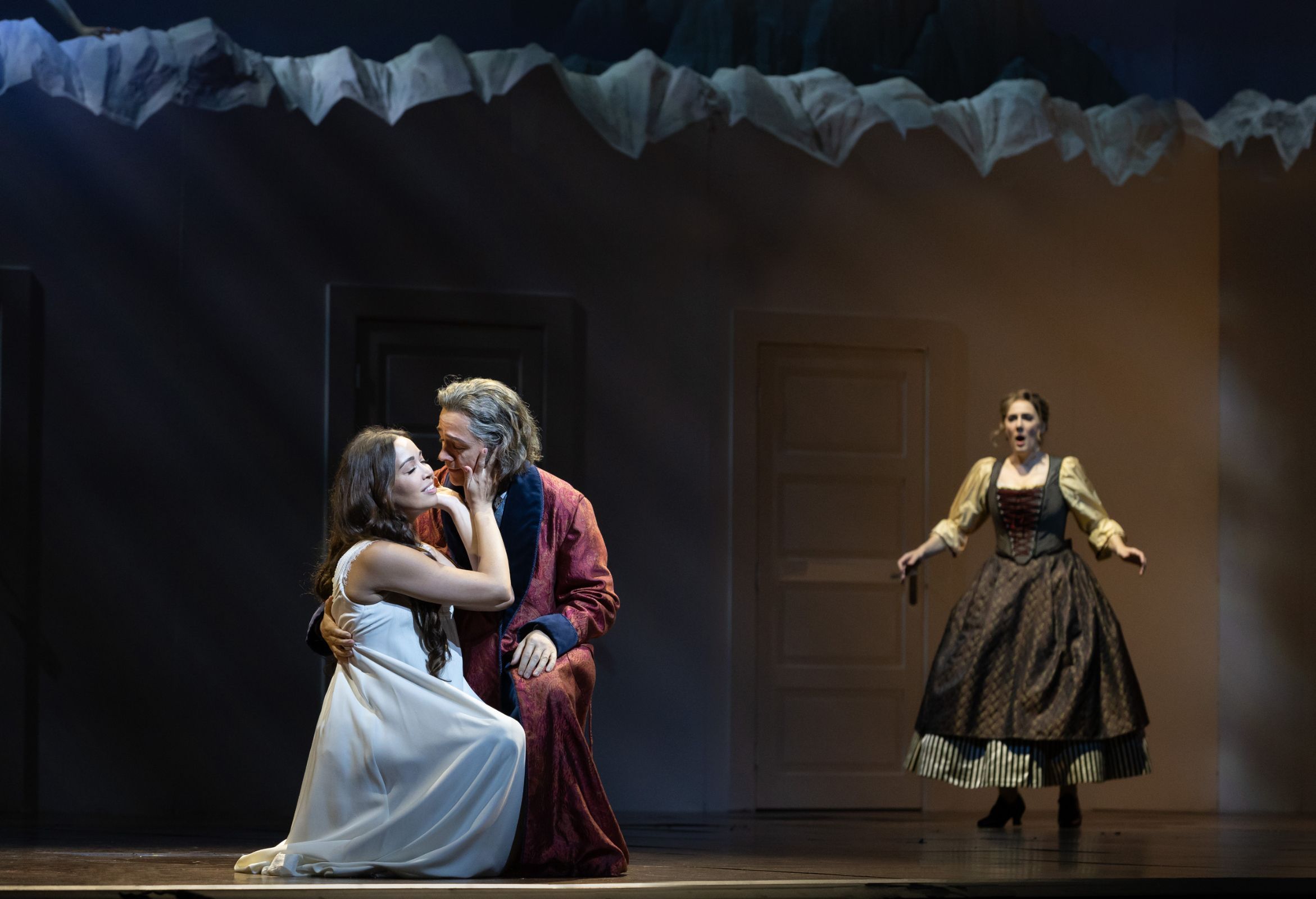 Nadine Sierra (Amina), Alexander Vinogradov (Rodolfo) and Sydney Mancasola (Lisa) &copy; Marty Sohl | Met Opera