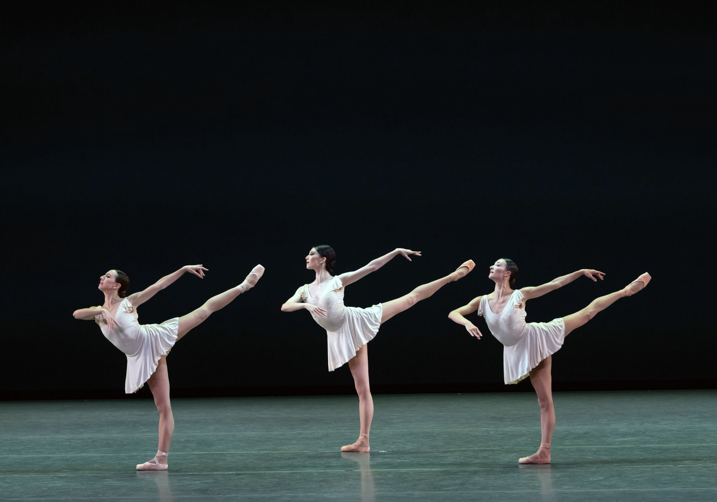 Isabella Boylston, Chloe Misseldine and Christine Shevchenko in Twyla Tharp's <i>Bach Partita</i> &copy; Nir Arieli