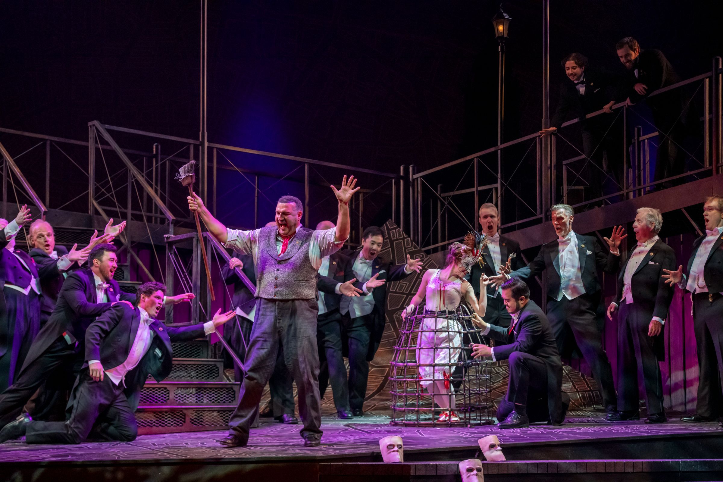 Michael Chioldi (Rigoletto) and ensemble &copy; Emily Cooper