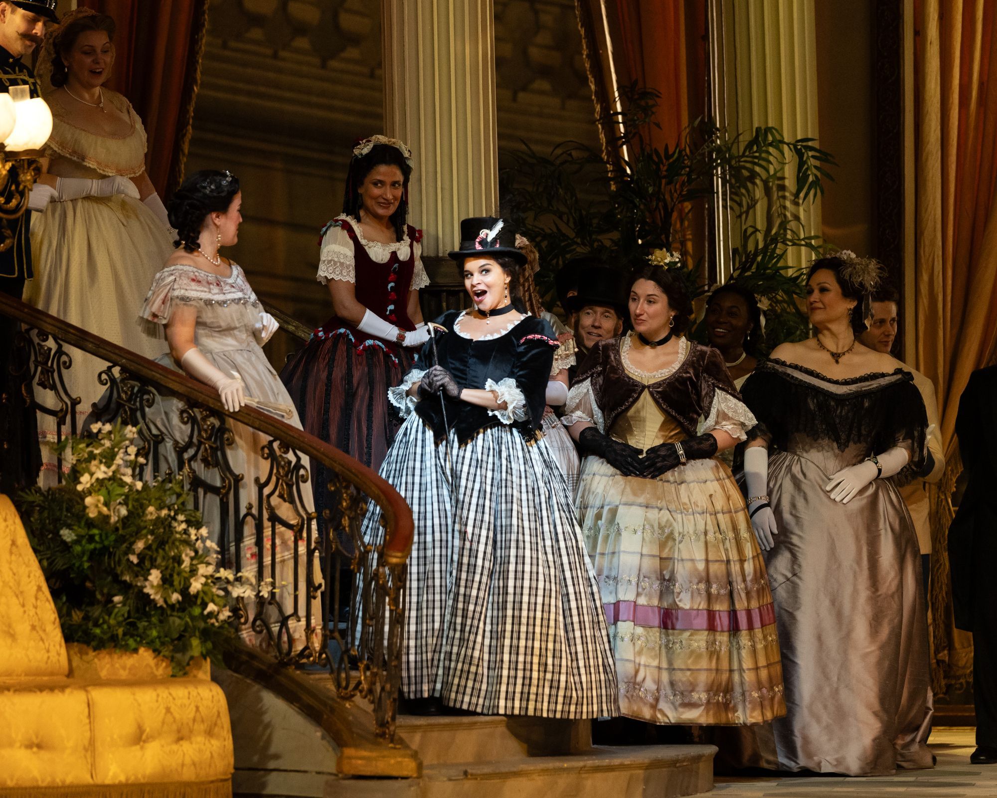 Julie Roset (Fiakermilli) and chorus &copy; Marty Sohl | Met Opera